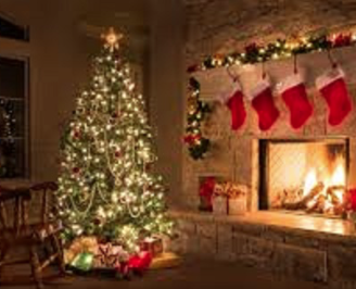 Image of Christmas tree in front of fireplace and stockings - Masters of Harmony Christmas show